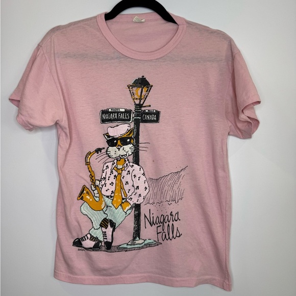 Vintage Tops - Vintage Worldpro Niagara Falls Pink jazz cat Graphic T-Shirt size medium